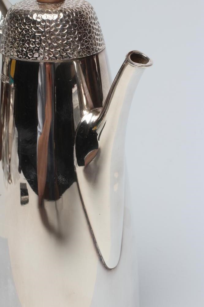 A FOUR PIECE SILVER TEA SERVICE Image