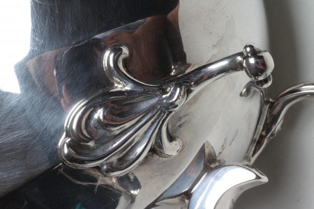 A FOUR PIECE SILVER TEA AND COFFEE SERVICE Image