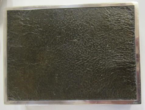 AN ART DECO SILVER CIGARETTE BOX Image