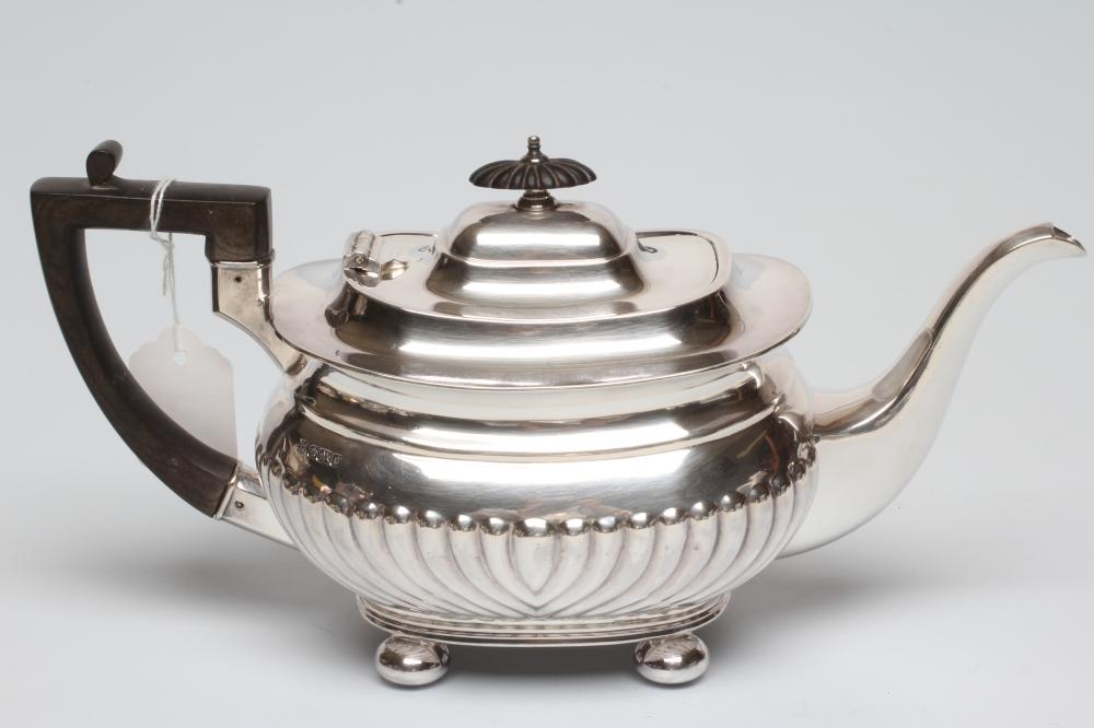 AN EDWARDIAN SILVER TEAPOT Image