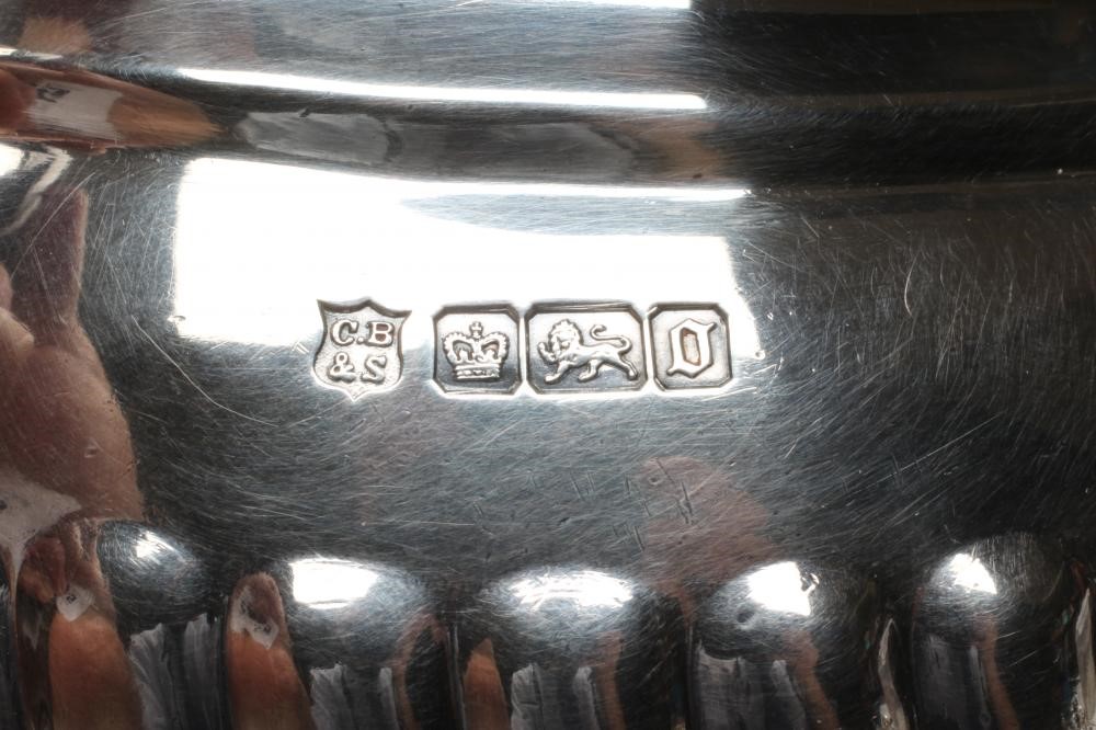 AN EDWARDIAN SILVER TEAPOT Image