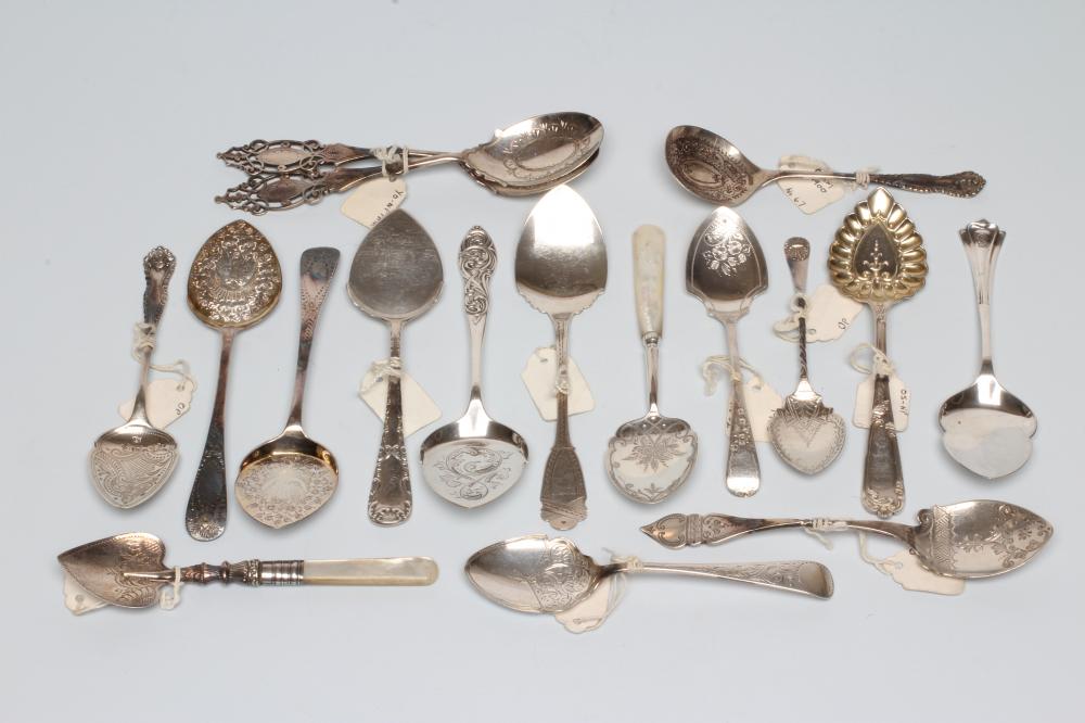 A COLLECTION OF VICTORIAN SILVER PRESERVE SPOONS including a pair with pierced handles Image