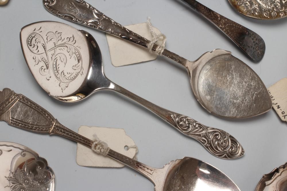 A COLLECTION OF VICTORIAN SILVER PRESERVE SPOONS including a pair with pierced handles Image