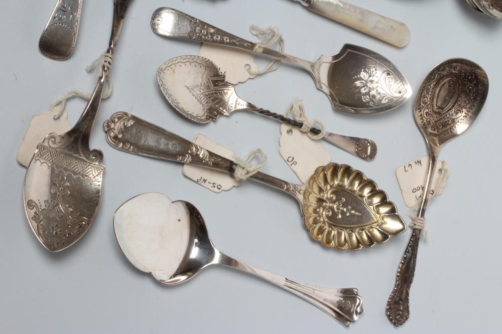 A COLLECTION OF VICTORIAN SILVER PRESERVE SPOONS including a pair with pierced handles Image