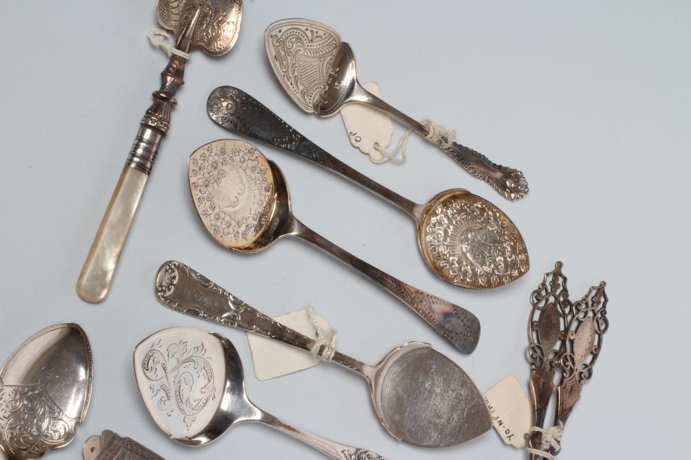 A COLLECTION OF VICTORIAN SILVER PRESERVE SPOONS including a pair with pierced handles Image