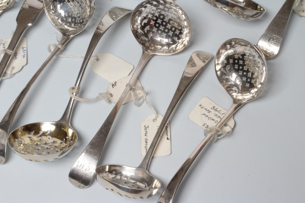 A COLLECTION OF GEORGE III AND LATER SILVER SUGAR SIFTER SPOONS Image