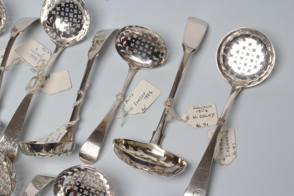 A COLLECTION OF GEORGE III AND LATER SILVER SUGAR SIFTER SPOONS Image