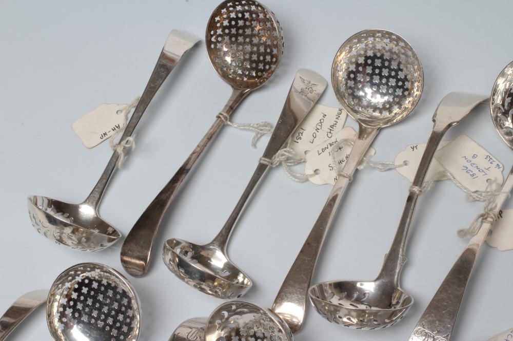 A COLLECTION OF GEORGE III AND LATER SILVER SUGAR SIFTER SPOONS Image