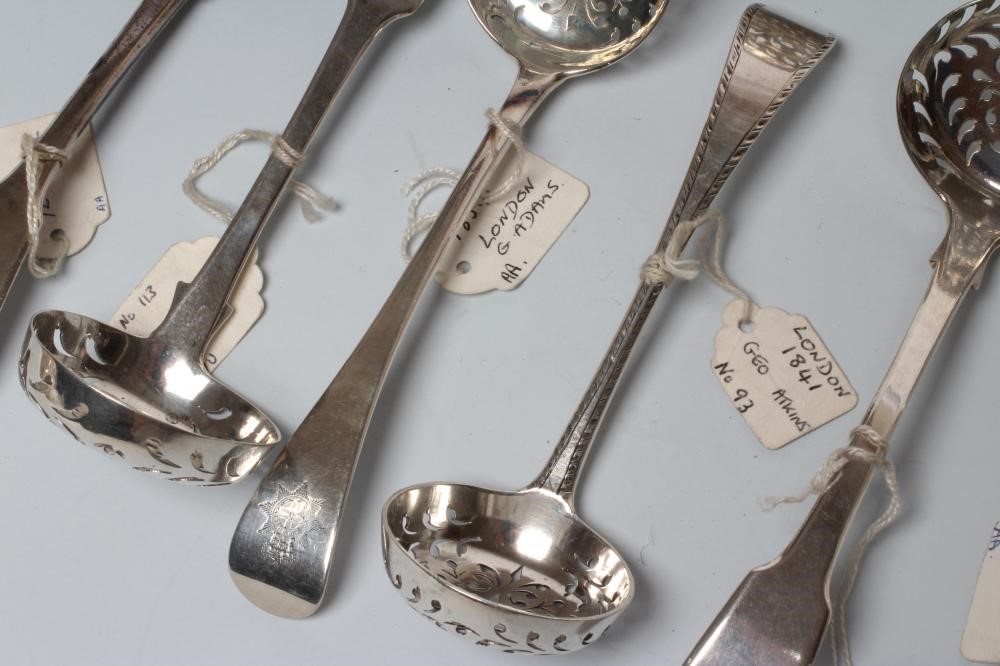 A COLLECTION OF GEORGE III AND LATER SILVER SUGAR SIFTER SPOONS Image