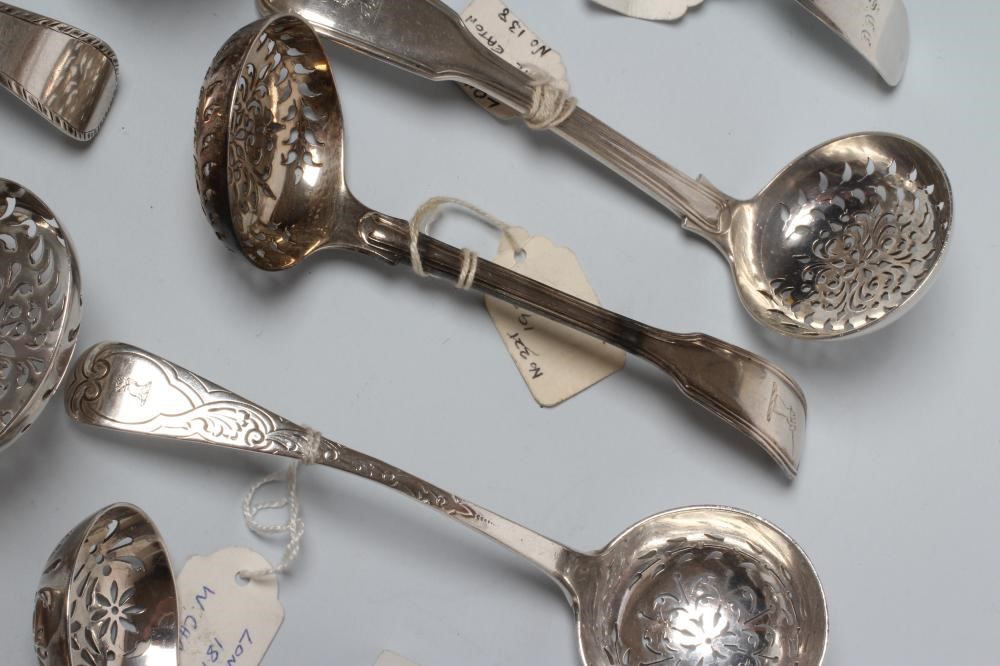 A COLLECTION OF GEORGE III AND LATER SILVER SUGAR SIFTER SPOONS Image