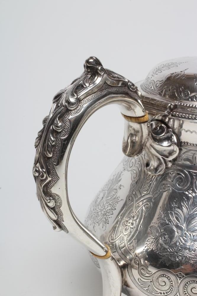 A VICTORIAN SILVER FOUR PIECE TEA AND COFFEE SERVICE Image