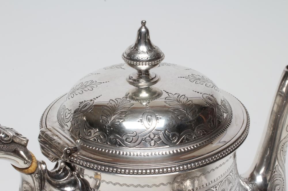 A VICTORIAN SILVER FOUR PIECE TEA AND COFFEE SERVICE Image
