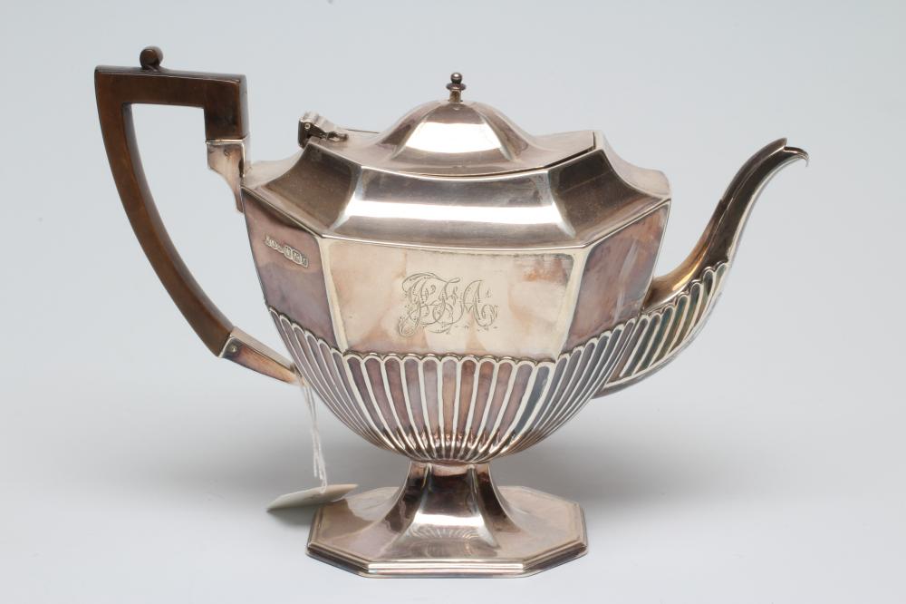A LATE VICTORIAN SILVER PEDESTAL TEAPOT Image