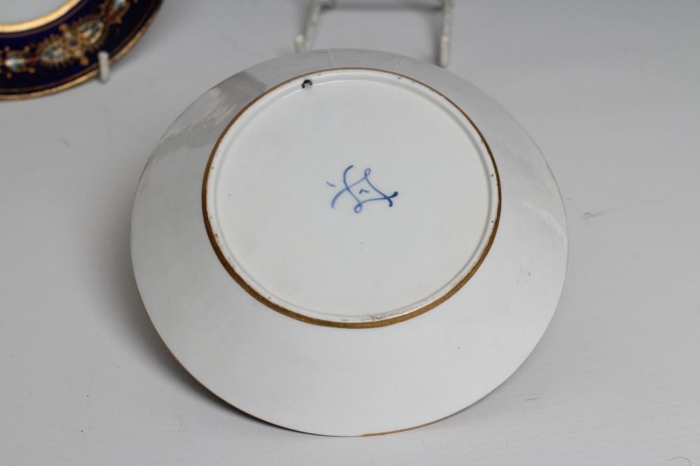 A FRENCH PORCELAIN CAN AND SAUCER Image