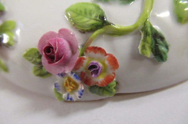 A PAIR OF MEISSEN PORCELAIN CABINET CUPS AND SAUCERS Image