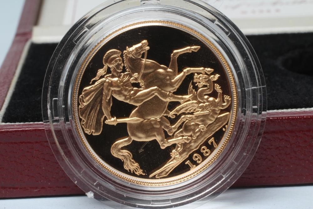 AN ELIZABETH II GOLD PROOF THREE COIN SET Image