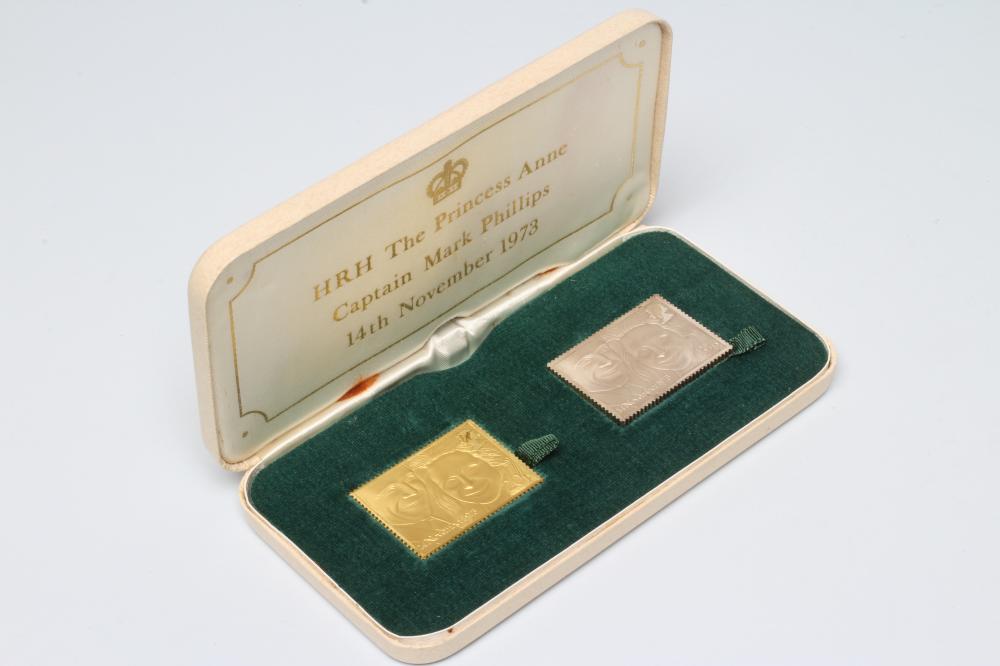 A 22ct gold and silver replica stamp set to commemorate the