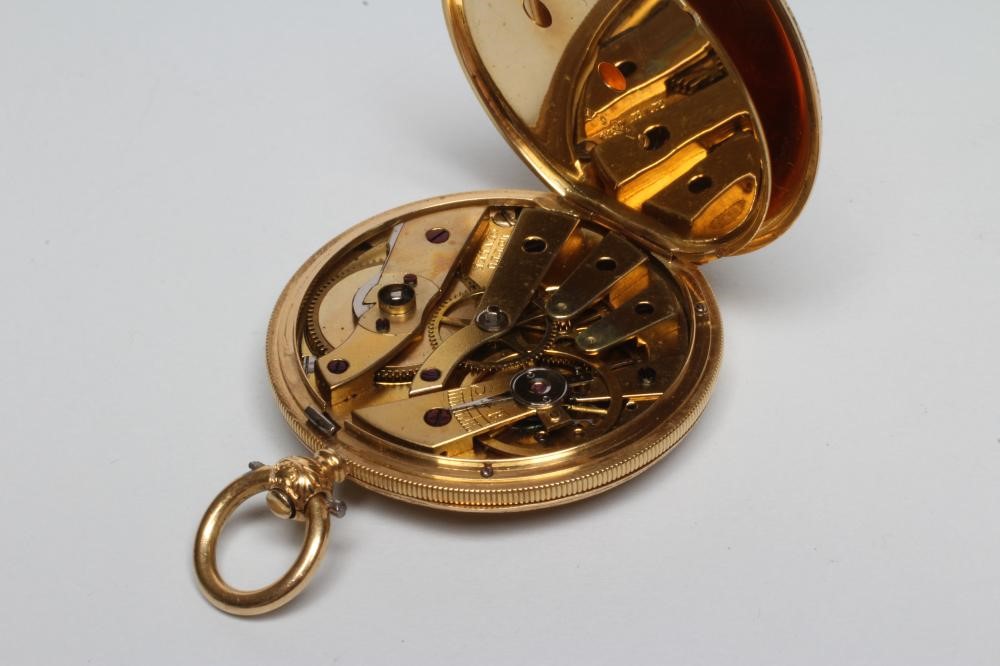 A LADY'S 18CT GOLD AND ENAMELLED FOB WATCH Image
