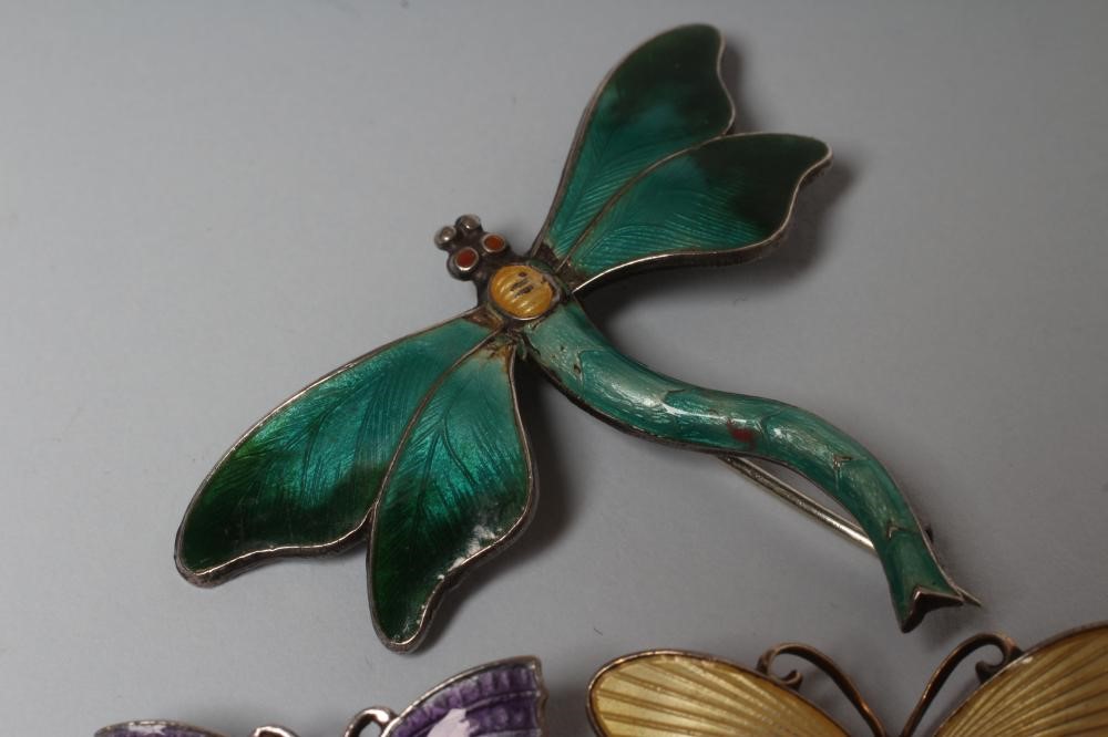 A STERLING SILVER AND ENAMEL DRAGONFLY BROOCH with green wings and tail and yellow thorax Image