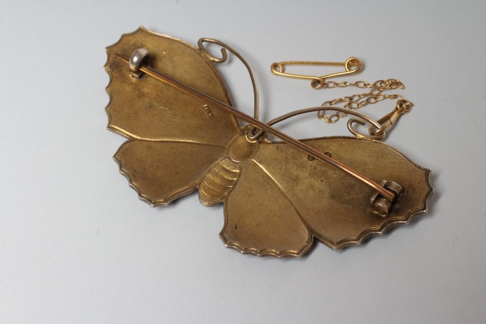 A SILVER GILT AND ENAMEL BUTTERFLY BROOCH Image
