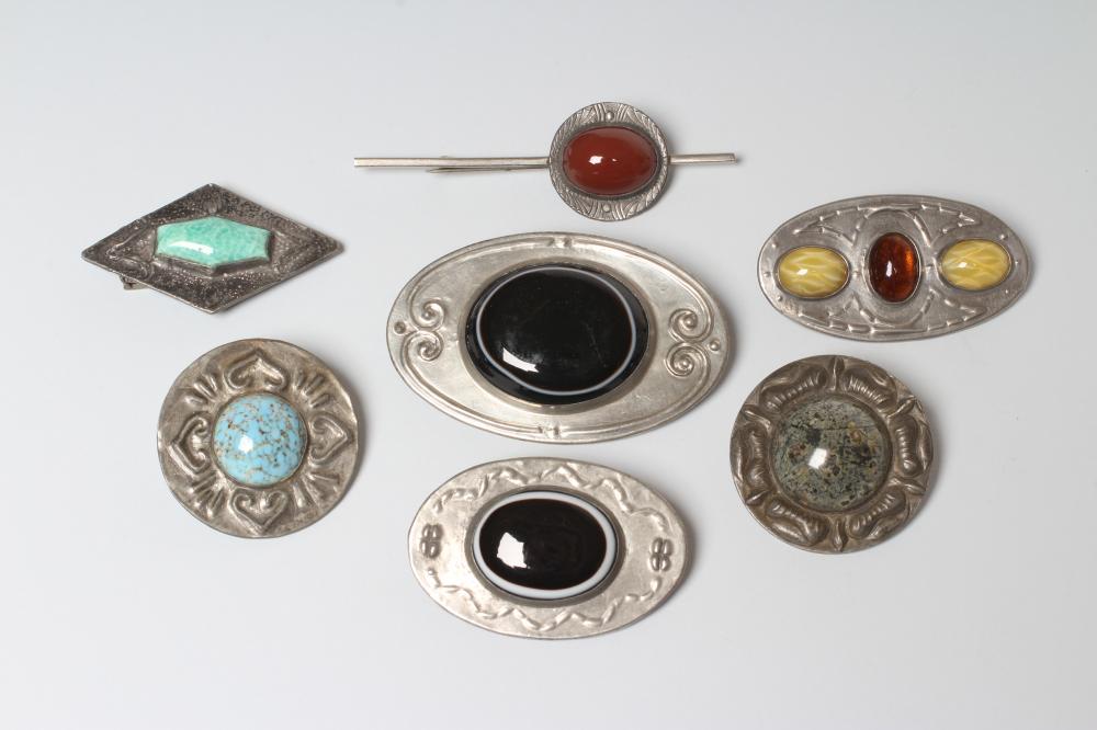 TWO ARTS AND CRAFTS PEWTER BROOCHES Image