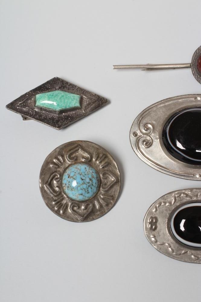 TWO ARTS AND CRAFTS PEWTER BROOCHES Image