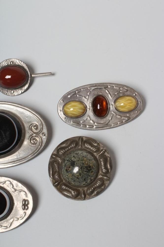 TWO ARTS AND CRAFTS PEWTER BROOCHES Image