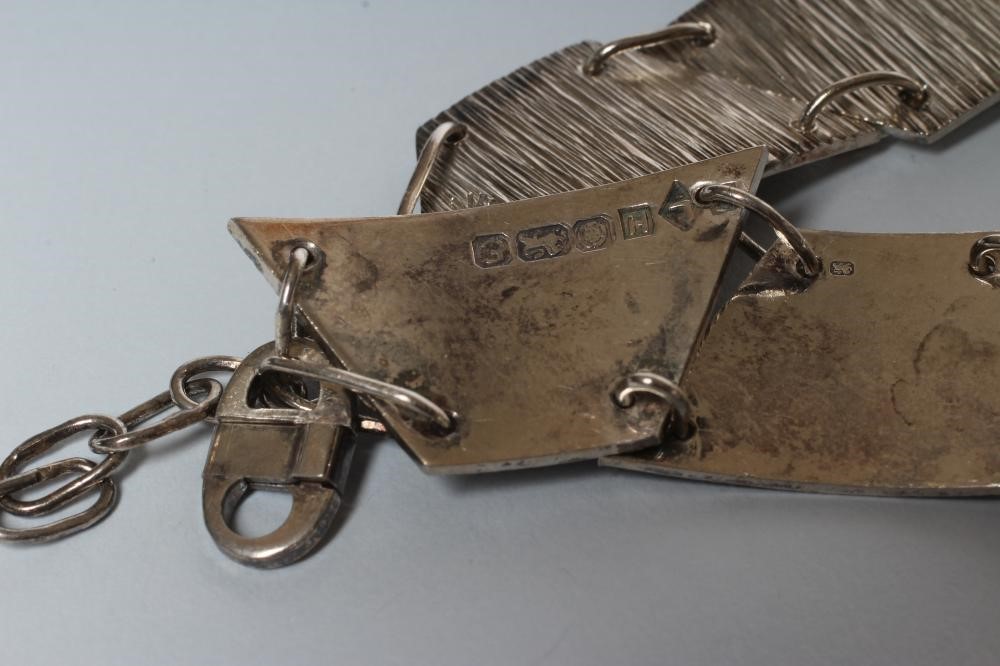 A PAIR OF SILVER BRACELETS Image