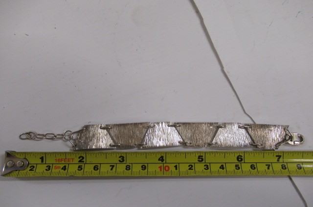 A PAIR OF SILVER BRACELETS Image