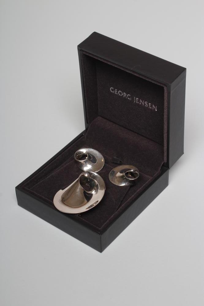 A GEORG JENSEN SILVER BROOCH and matching clip earrings Image