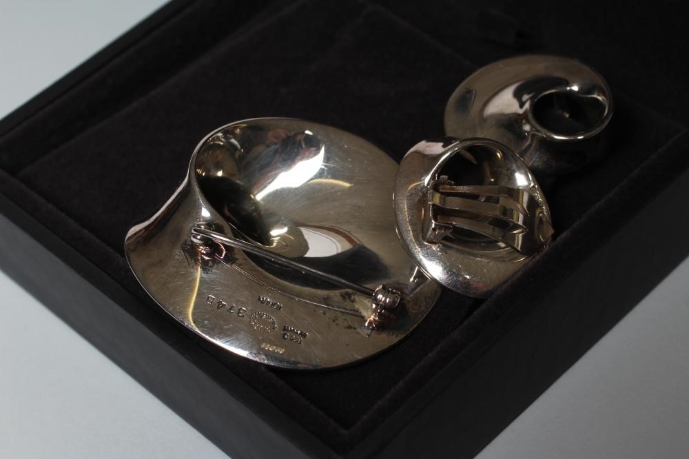 A GEORG JENSEN SILVER BROOCH and matching clip earrings Image