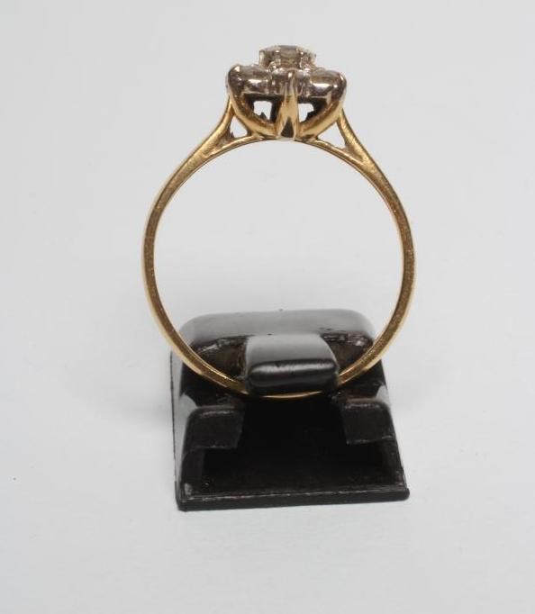 A DIAMOND CLUSTER RING Image