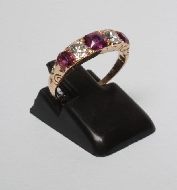 A  FIVE STONE RUBY AND DIAMOND RING Image