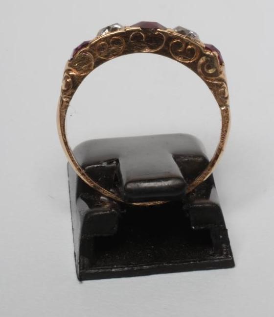 A  FIVE STONE RUBY AND DIAMOND RING Image