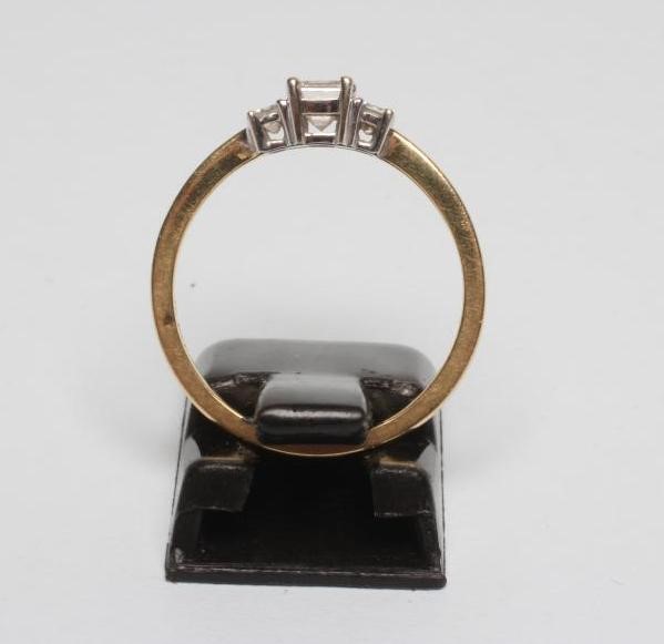 A THREE STONE DIAMOND RING Image