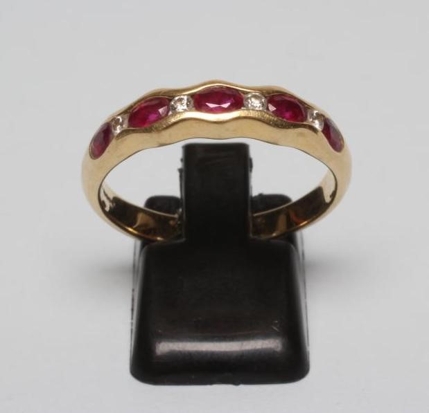 A RUBY HALF HOOP RING Image