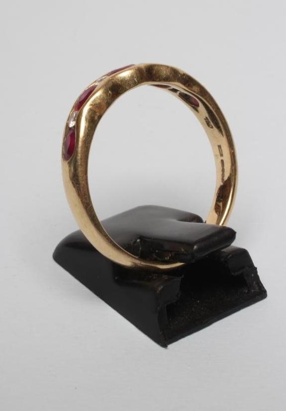 A RUBY HALF HOOP RING Image