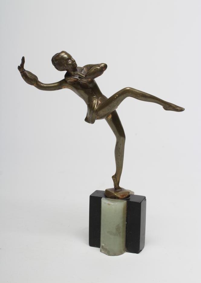 AFTER LORENZL - an Art Deco bronzed spelter figure of a dancing girl balancing on her left leg Image