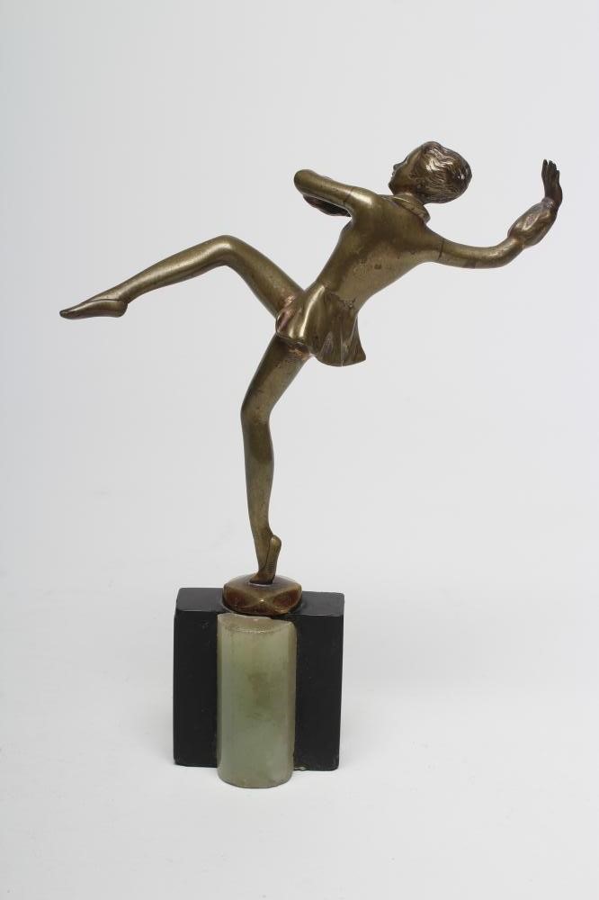 AFTER LORENZL - an Art Deco bronzed spelter figure of a dancing girl balancing on her left leg Image