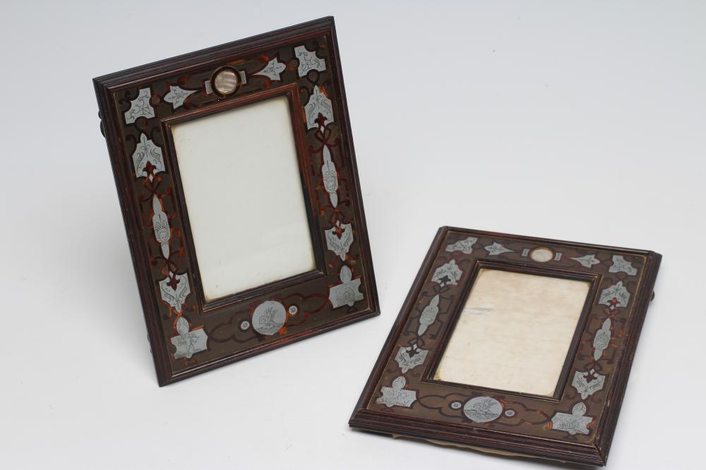 A PAIR OF ENGLISH EDWARDIAN CONTRA-PARTIE BOULLE PHOTOGRAPH FRAMES of plain strut back oblong form Image