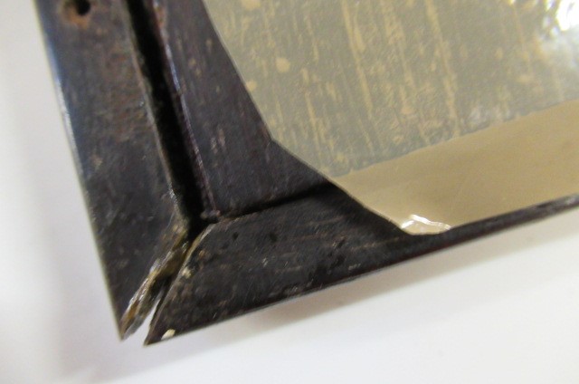 A PAIR OF ENGLISH EDWARDIAN CONTRA-PARTIE BOULLE PHOTOGRAPH FRAMES of plain strut back oblong form Image