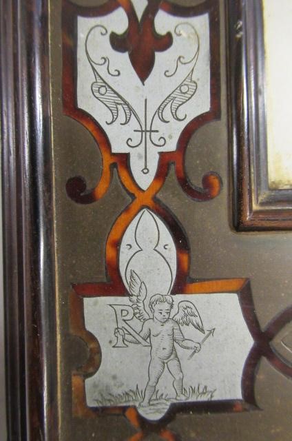 A PAIR OF ENGLISH EDWARDIAN CONTRA-PARTIE BOULLE PHOTOGRAPH FRAMES of plain strut back oblong form Image