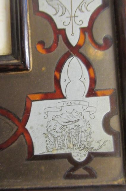 A PAIR OF ENGLISH EDWARDIAN CONTRA-PARTIE BOULLE PHOTOGRAPH FRAMES of plain strut back oblong form Image