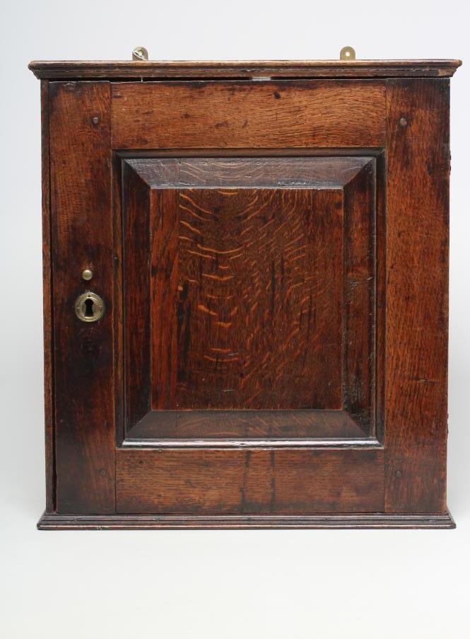 AN OAK SPICE CUPBOARD Image