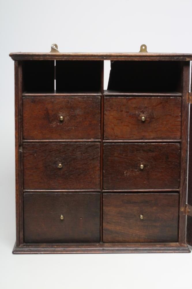 AN OAK SPICE CUPBOARD Image