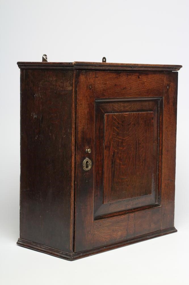 AN OAK SPICE CUPBOARD Image