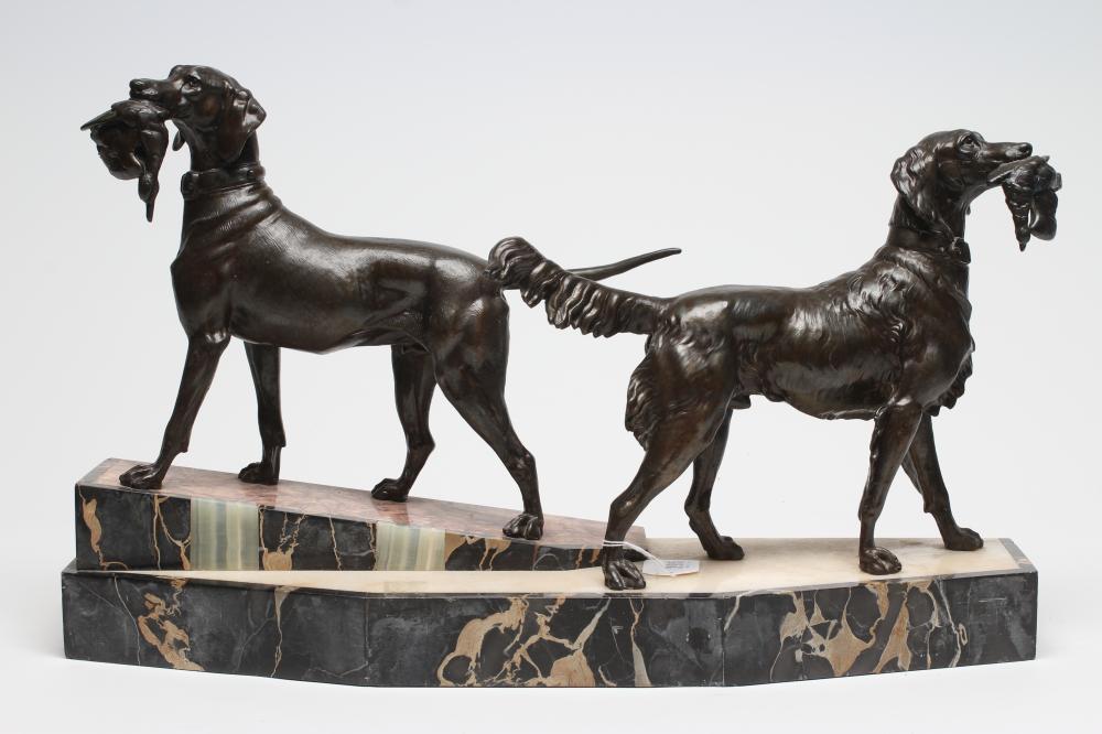 AN ART DECO BRONZED METAL GROUP of a retriever and a setter Image