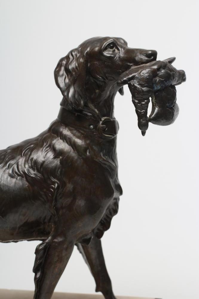 AN ART DECO BRONZED METAL GROUP of a retriever and a setter Image