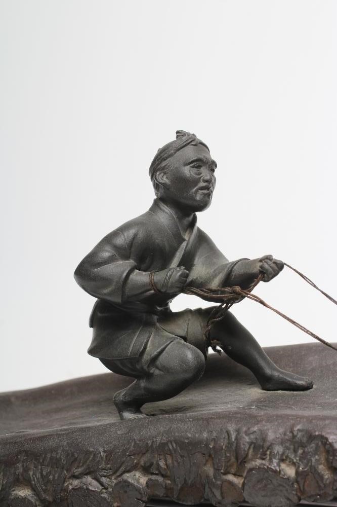 A JAPANESE BRONZE GROUP Image