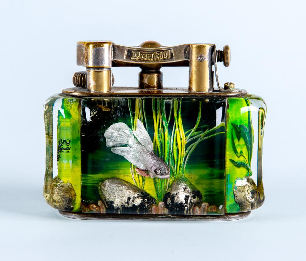 A DUNHILL LUCITE AQUARIUM TABLE LIGHTER by Margaret Bennett Image